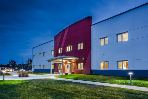 Nighttime photo of Cape Cod UPH building exterior