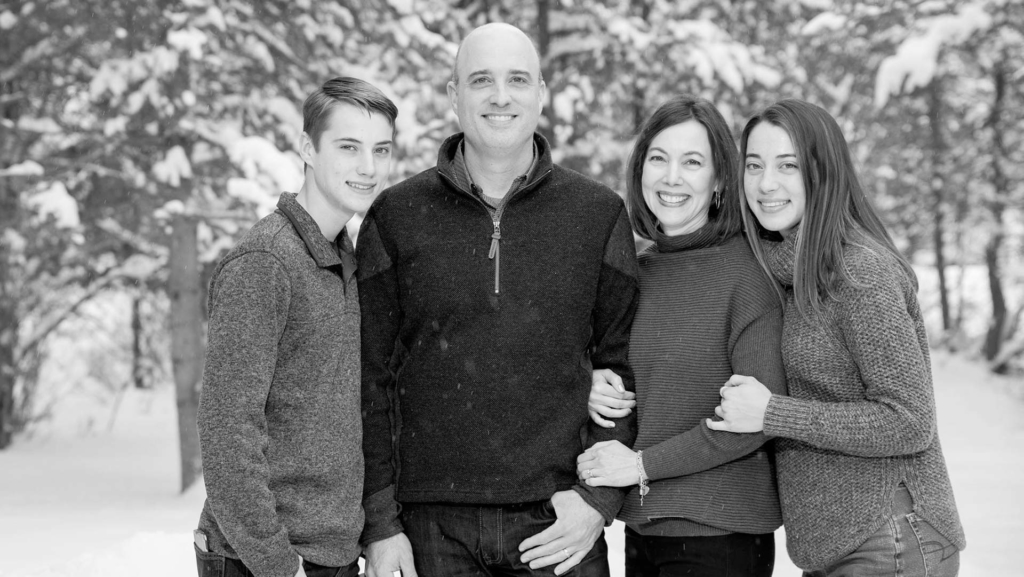 Winter scene photo of Haskell employee Todd Miller and family