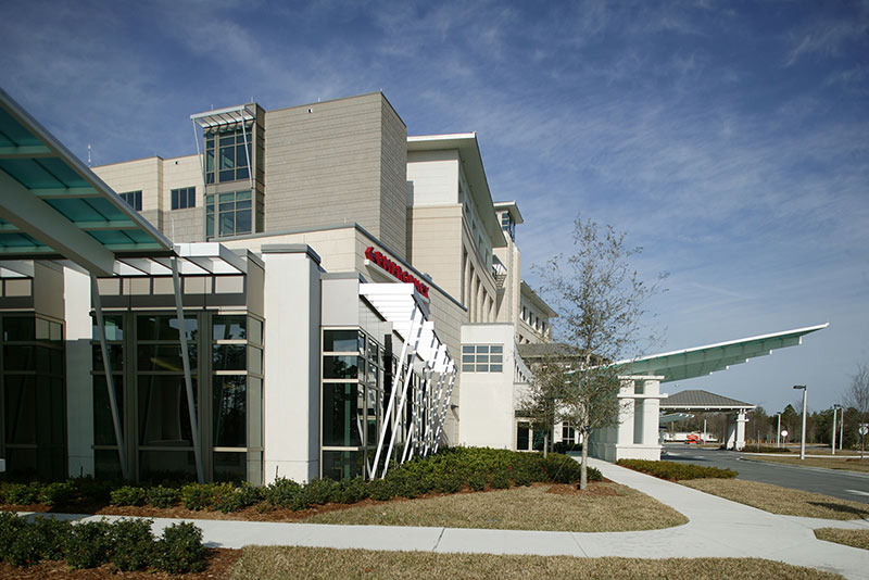 Exterior photo of emergency room entrance and building architecture at Baptist Medical Center South