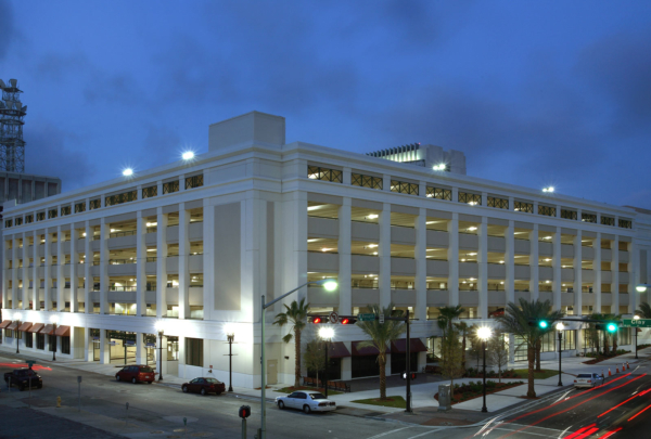 Exterior photo of City of Jacksonville parking garage at dusk.