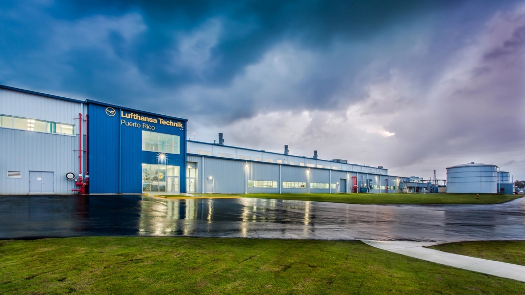 Exterior of Lufthansa Technik Heavy Maintenance Facility at dusk.