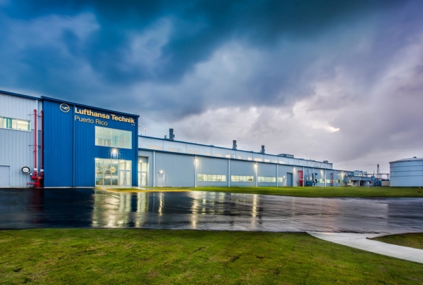 Exterior of Lufthansa Technik Heavy Maintenance Facility at dusk.