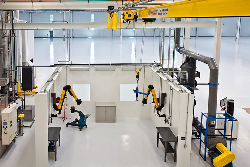 Interior robotics in the Rolls Royce Crosspointe Rotatives Facility.