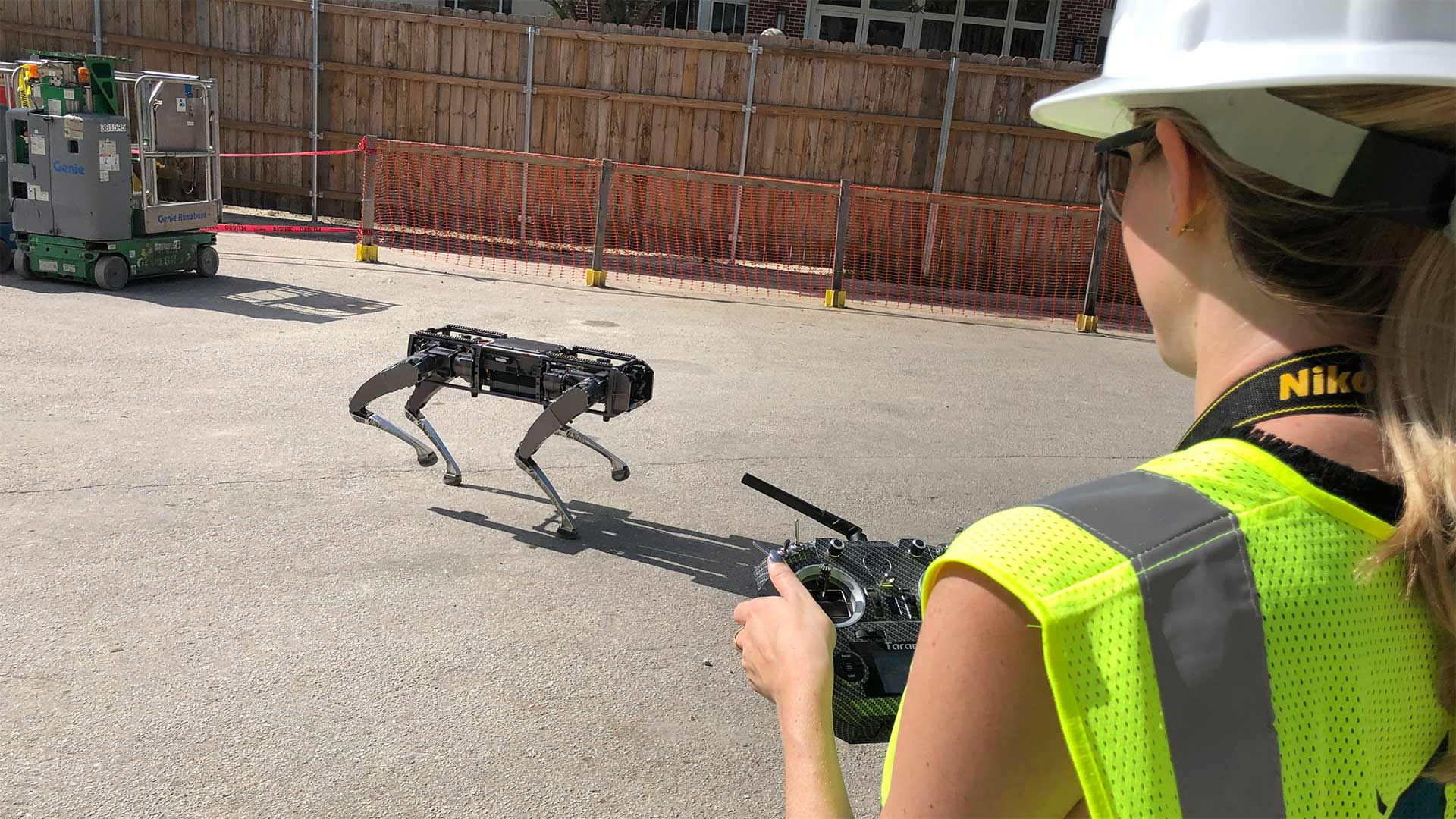 Person remotely driving a robot.