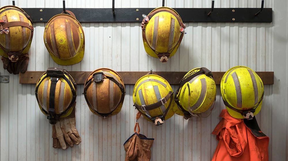 Safety equipment hanging on a wall.