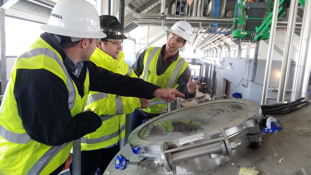 Haskell employees working in distillery.