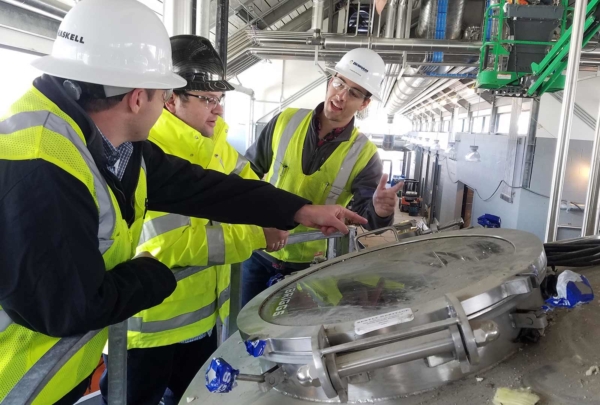 Haskell employees working in distillery.