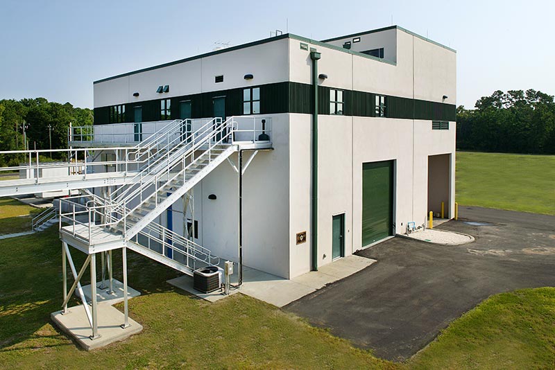 Exterior photo of green and white facility