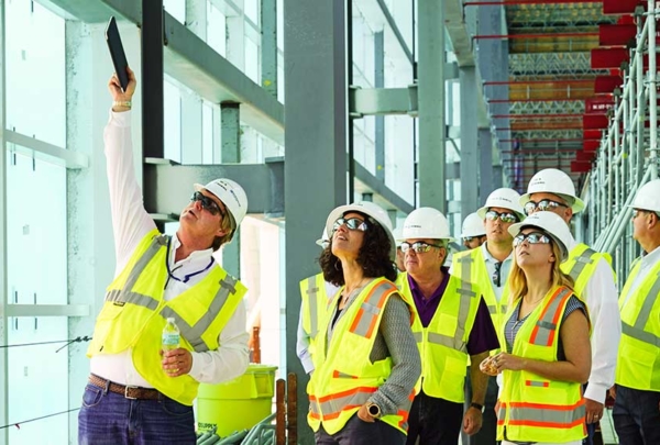 People touring a construction site.