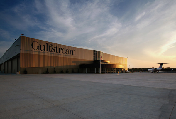 Gulfstream hangar with airplane parked out front.