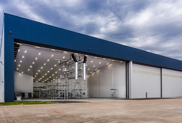 Exterior of airplane hangar.