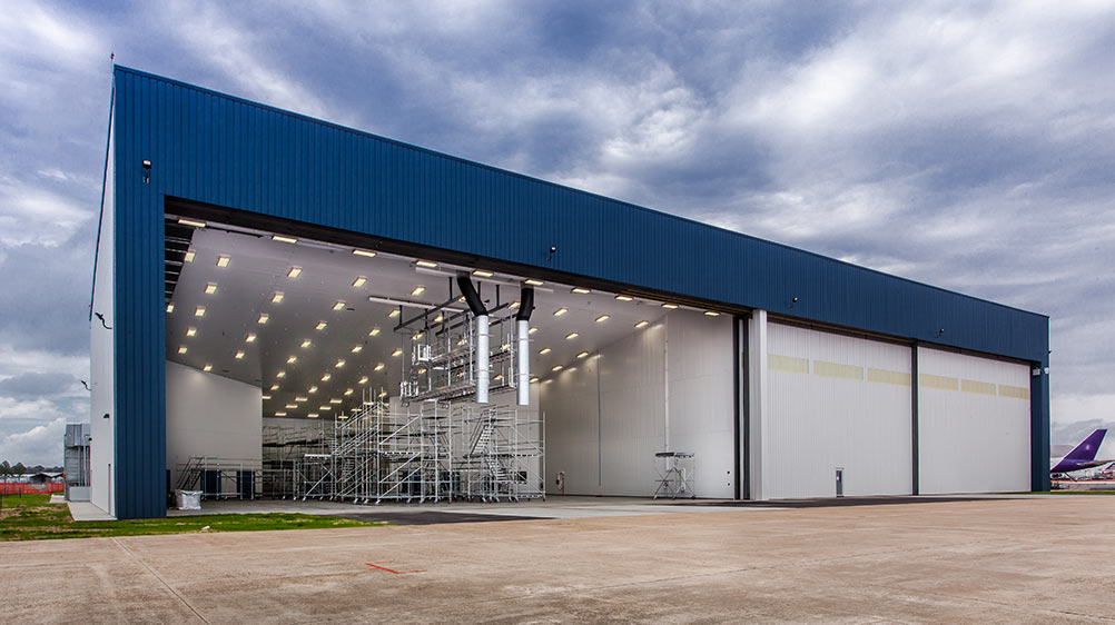 Exterior of airplane hangar.