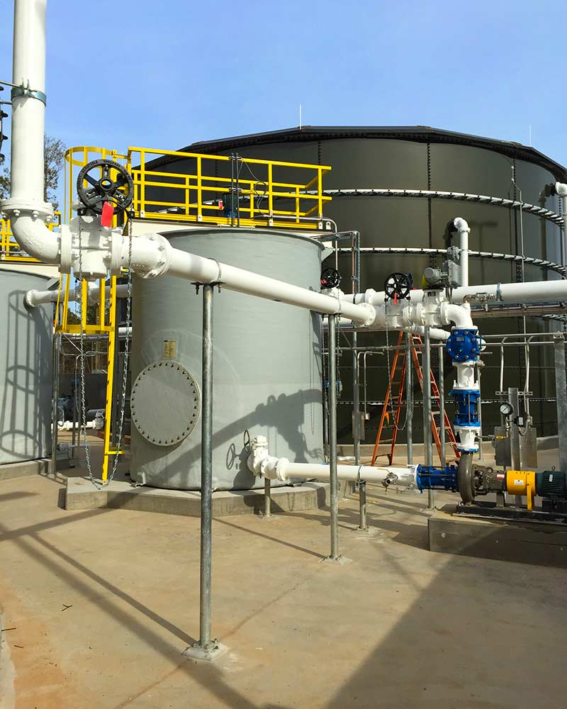 Exterior photo of Greenfield Biologics Facility process tanks and piping