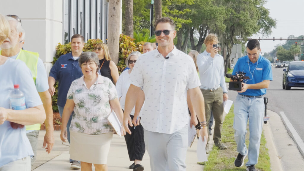 Fred Jones, Director of Haskell’s Planning + Design Collaborative, leads a Walking Audit during the master planning process with stakeholders in Orange Park, Florida.