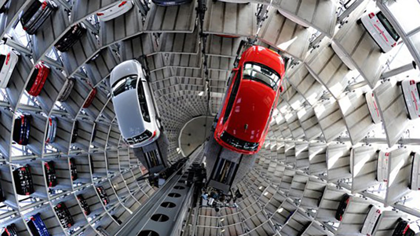 Automated parking tower.|Parking garage in the evening.|Parking garage in the evening.|Parking garage at night.|Glass parking tower.|||||