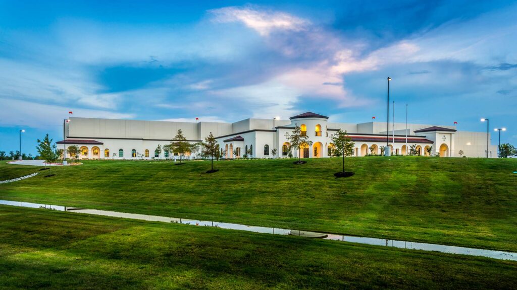 Facility exterior at dusk.|||||||||