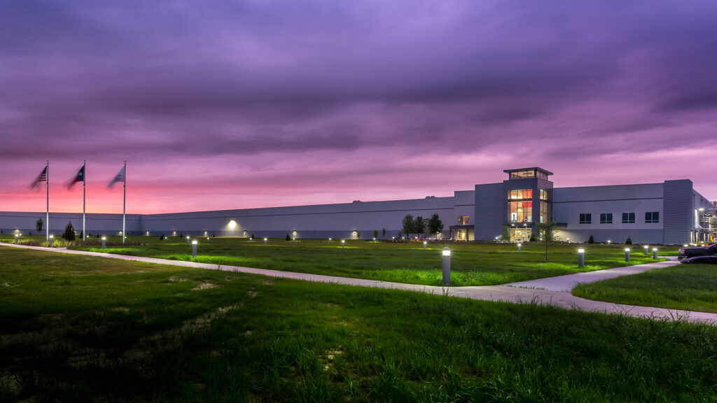 Exterior photo of Project Northpoint at dusk|Tilt-up construction photo|Construction photo of Project Northpoint|Interior construction photo of Project Northpoint|Exterior rendering of Project Northpoint|Footings under construction|Construction crew meeting in progress|Exterior photo of Project Northpoint at dusk||||||||