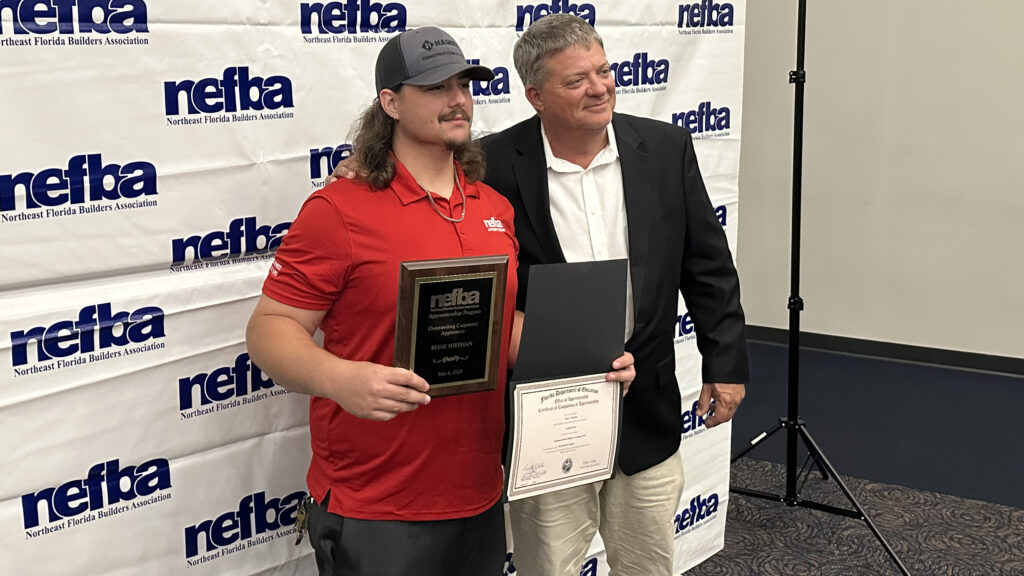 Reese Sheehan, left, is pictured with Haskell Director of Self-Performance Tim Mosley after Sheehan received the NEFBA Outstanding Carpentry Apprentice Award.