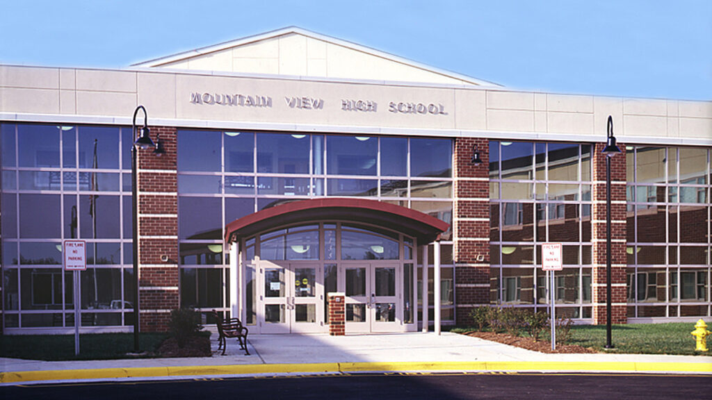 Exterior photo of Mountain View High School|Mountain View High School sports field|