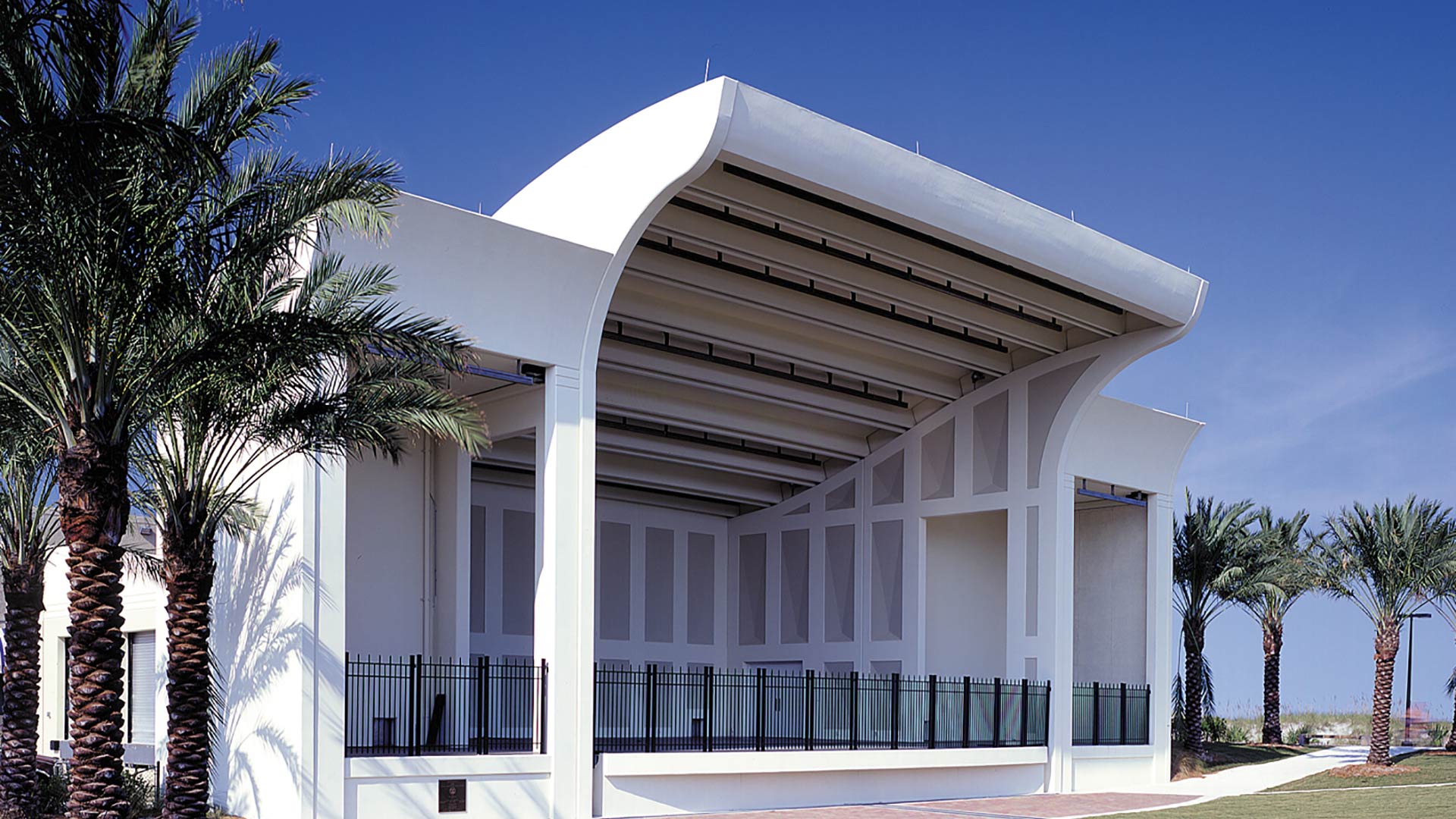Exterior photo of Sea Walk Pavilion. Palm trees line either side of the venue.