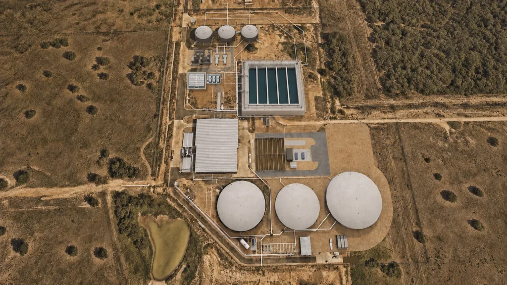 Aerial rendering of a water treatment plant expansion showing new clearwells, plate settlers, filtration and support facilities.