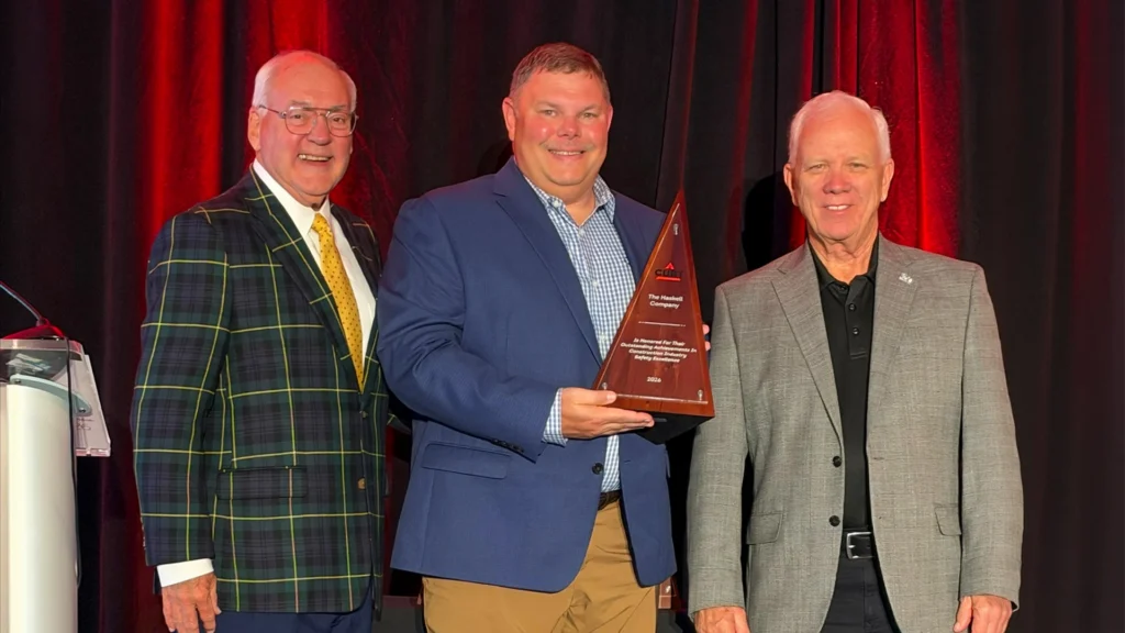 Ben Goode, Haskell Director of Corporate Safety (center), is pictured with Greg Palmer, CURT President (left), and Herb Strong, CURT member and CISE award panelist.
