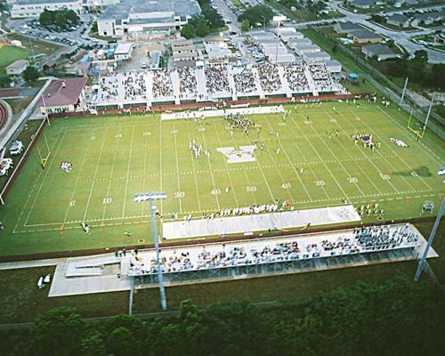 Aerial photo of Astronaut High School War Eagle Stadium during football game