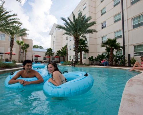 Photo of students enjoying the lazy river pool