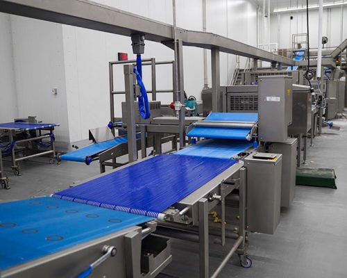 Quik Trip production line with blue food grade conveyor belt