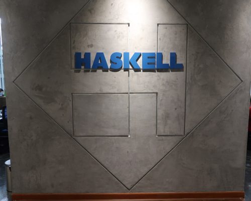 Interior wall detail with Haskell signage