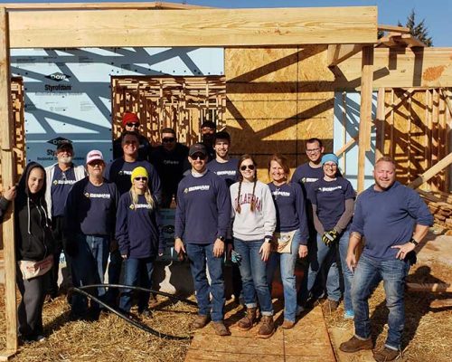 Oklahoma City employees volunteer to build homes with Habitat for Humanity