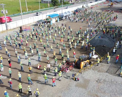 Philippines office employees practice social distancing during safety awards ceremony