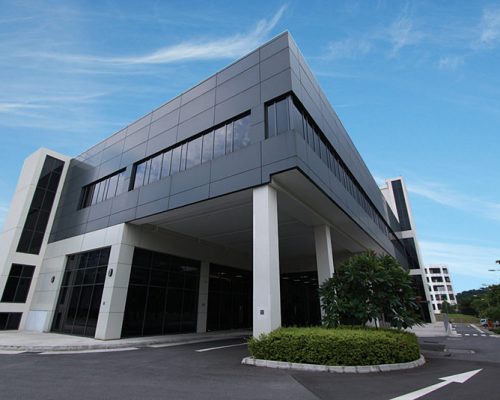 Wide angle exterior photo of the Haskell Singapore office building