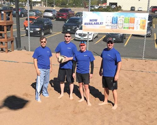 Saint Paul employees team up for volleyball