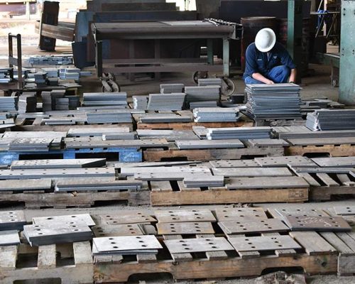 Structural components awaiting assembly in the Haskell Steel Shop