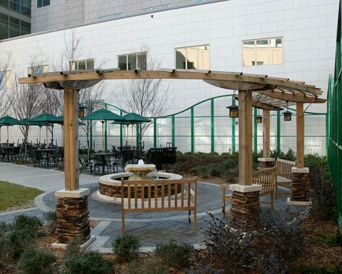 Exterior photo of courtyard with a pergola at Baptist Medical Center South
