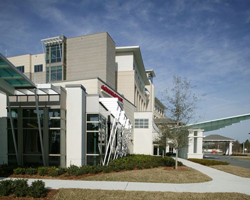 Exterior photo of emergency room entrance and building architecture at Baptist Medical Center South