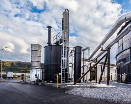 Exterior photo of tanks and vertical processing equipment