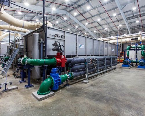 Piping, clarifier, and other mechanical equipment inside the facility