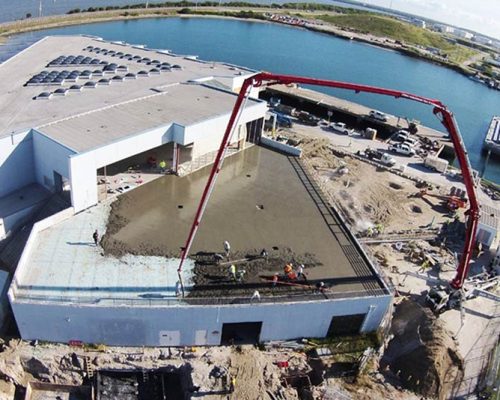 Aerial photo of Canaveral Port Authority Cruise Terminal 5. Concrete pour in progress.