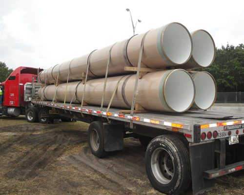 Pipes on a semi-truck bed