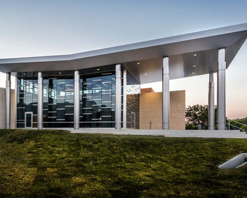 Frisch Welcome Center exterior at dusk