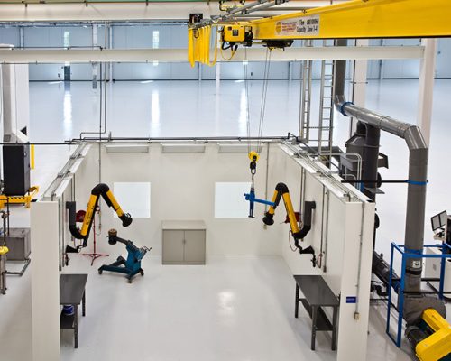 Interior robotics in the Rolls Royce Crosspointe Rotatives Facility.