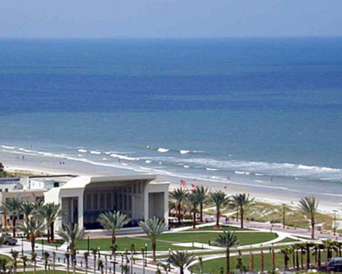 Aerial view of an empty Sea Walk Pavilion with a view of the Atlantic Ocean in the background.