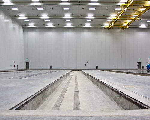 Interior of Spirit AeroSystems Composite Center. Large open room with fluorescent lighting.