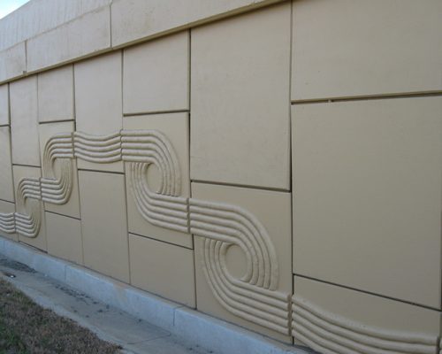 Detail of concrete retaining wall with decorative design